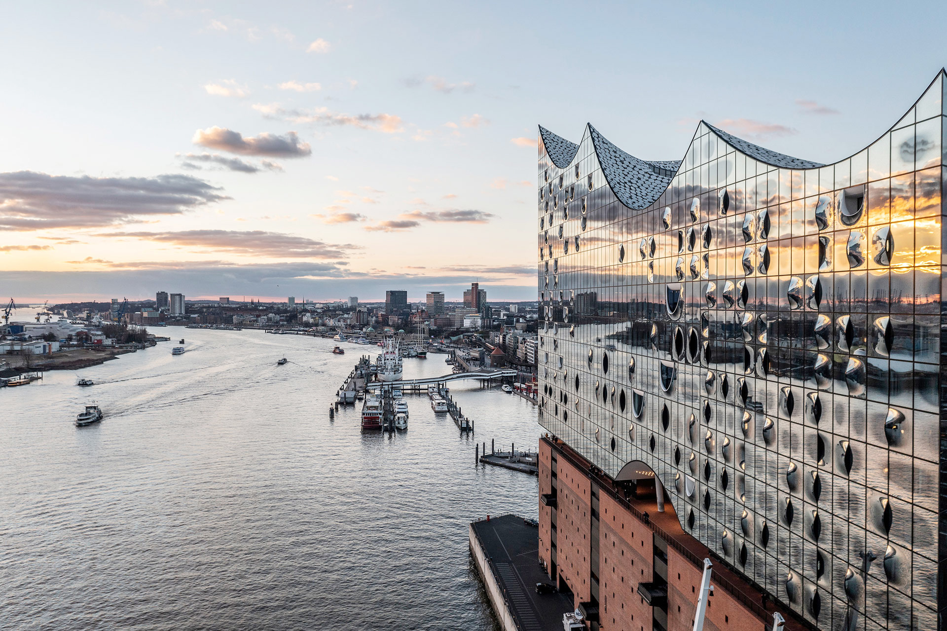 Harbour architecture on the Elbe in Hamburg at sunset