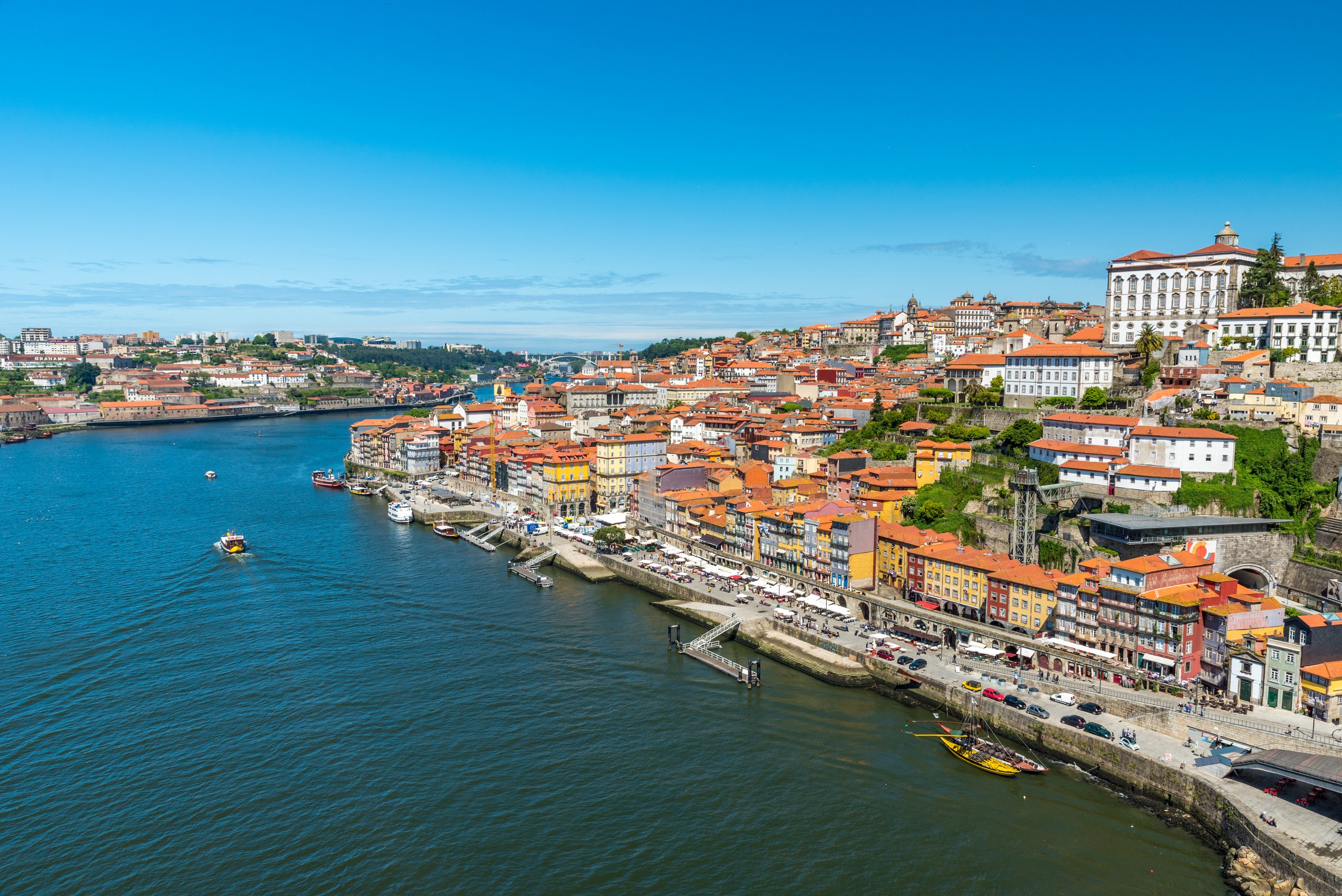 Porto old town on the riverside with orange roofs